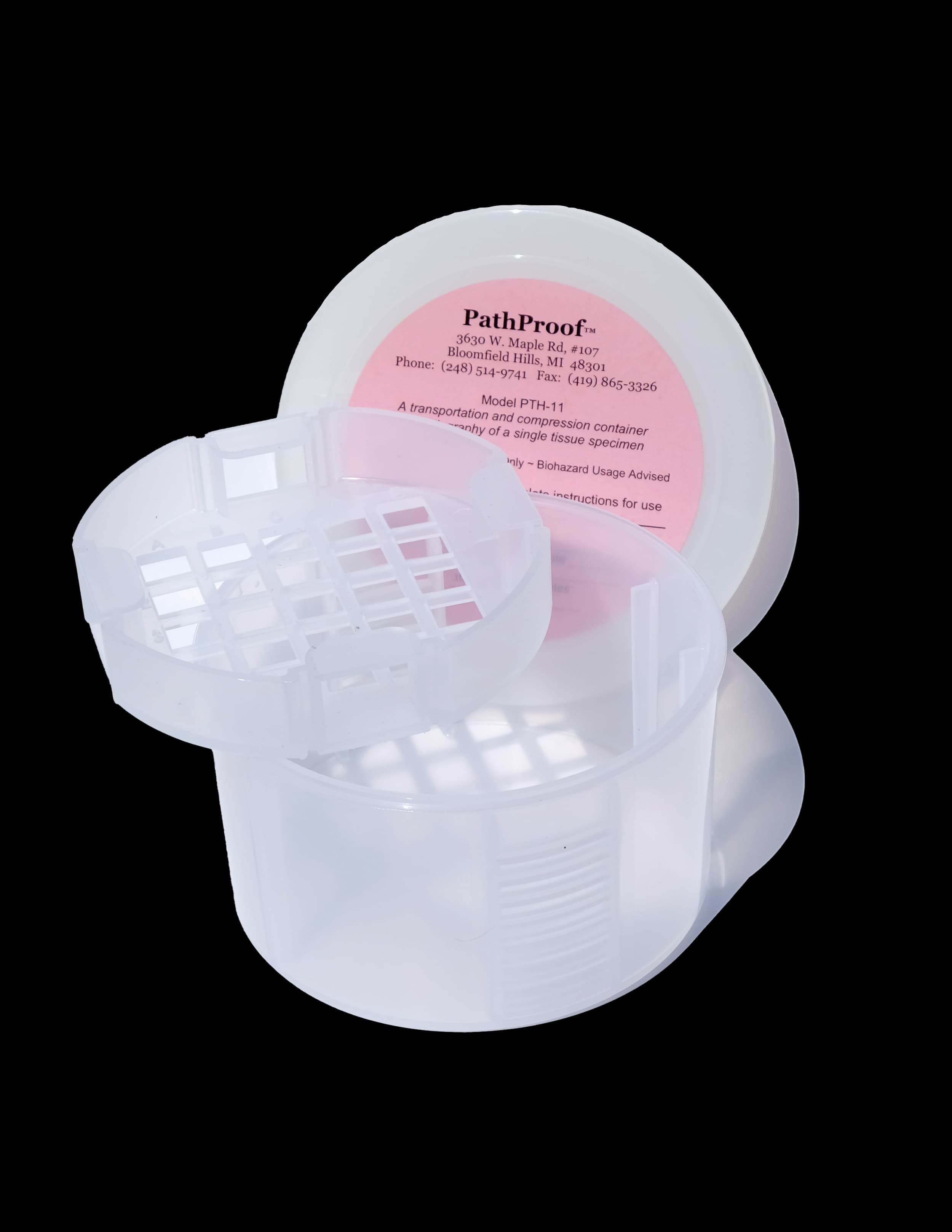 PathProof specimen container, open, showing the alphanumeric compression grid and snap-on lid